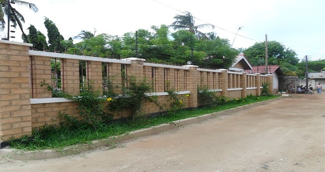 Ukuta wa Nyumba uliojengwa kwa kutumia matofali ya kufungamana Mikocheni-Dar es salaam