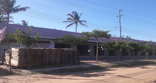 Jengo la biashara lililoezekwa kwa kutumia vigae vya NHBRA huko Mivumoni jijini Dar es salaam